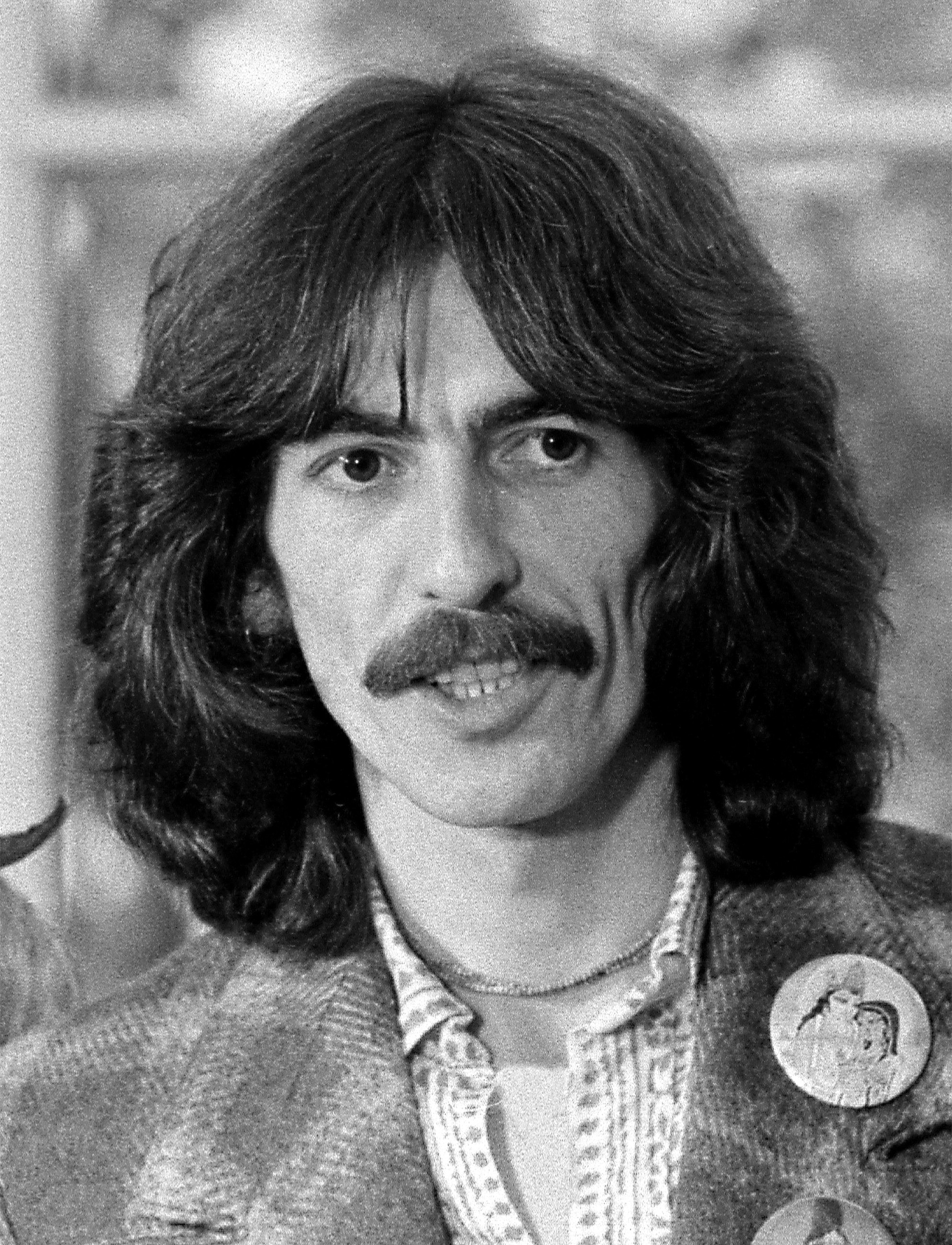 auteur George Harrison de la citation Je préfère être un musicien que une rock star.