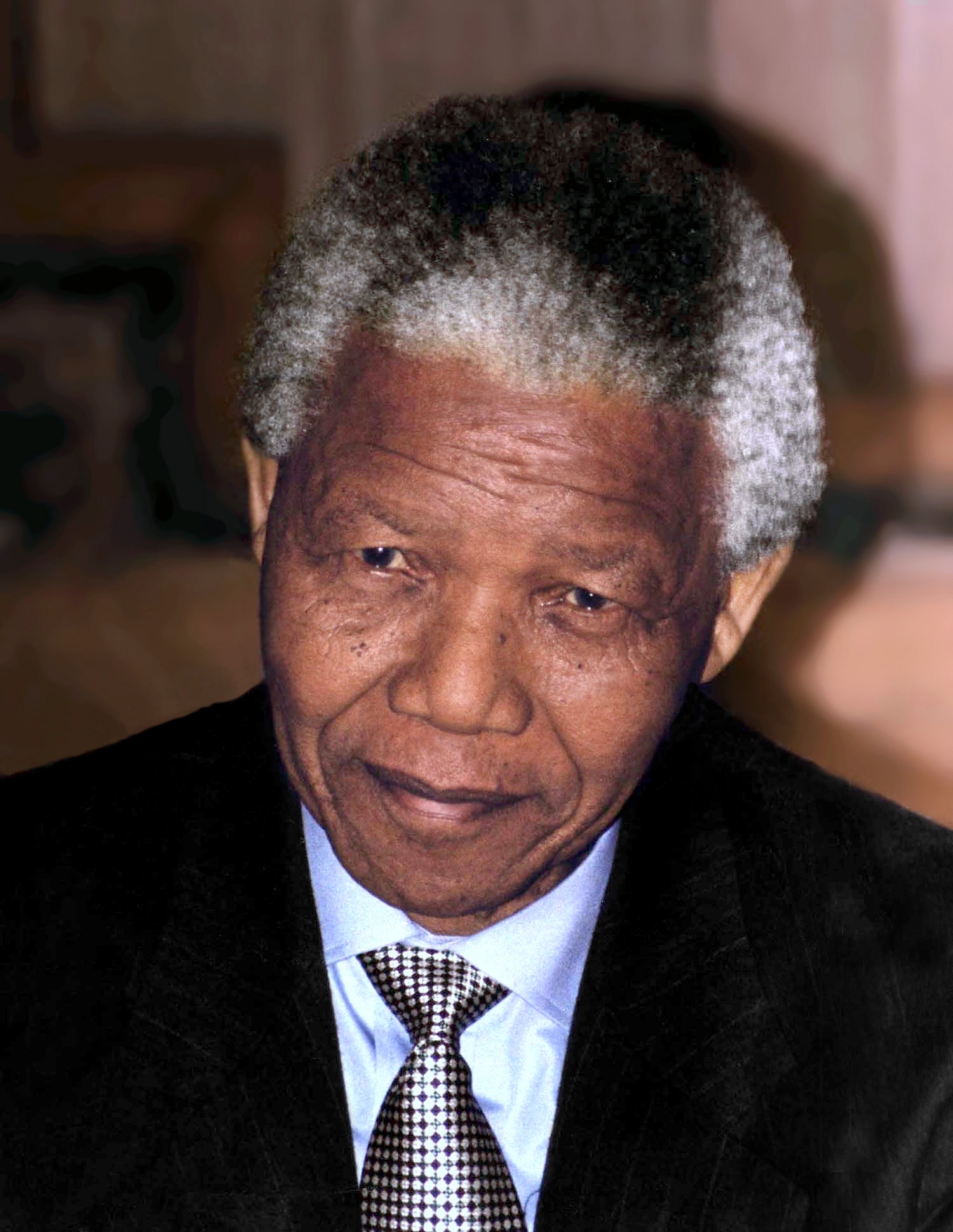 auteur Nelson Mandela de la citation L'amour vient plus naturellement au cœur humain que son contraire.